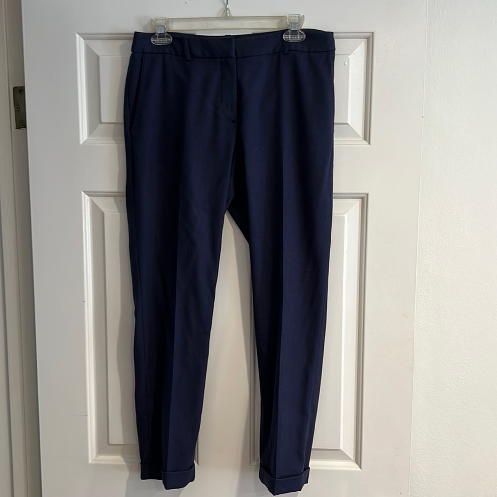 Blue stretch stovepipe trousers, with cuffed leg. Really flattering.